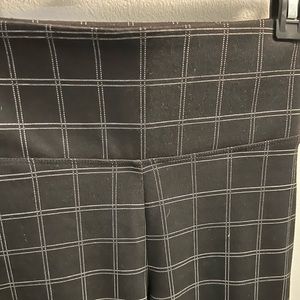 Slim fit black window pane professional style with these women's pants.